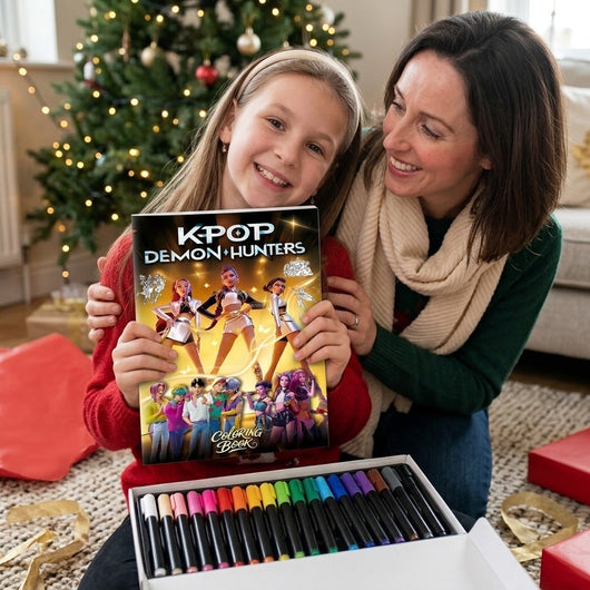 Christmas morning: a girl holds up her K-Pop Coloring Set with her mum