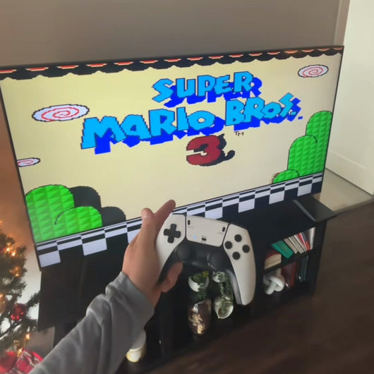Super Mario Bros. 3 on the TV with the controller