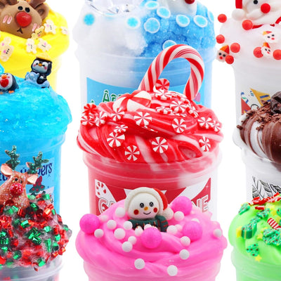 Close-up of the Christmas slimes with charms and toppings